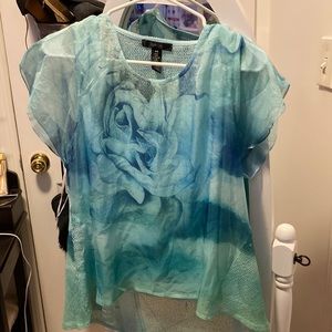 Style & Co. light green and blue floral top. Never worn with tag. Size PM.